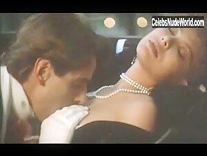 Ornella Muti Kissing , Nipple in Un amour de Swann (1984) 13