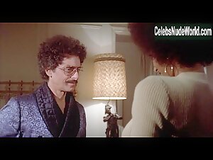 Pam Grier nude, boobs scene in Coffy (1973) 15