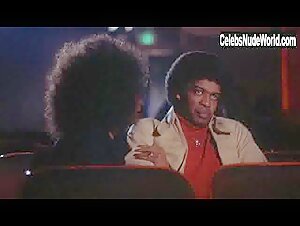 Pam Grier nude, boobs scene in Hit Man (1972) 11