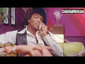 Pam Grier nude, boobs scene in Hit Man (1972) 13