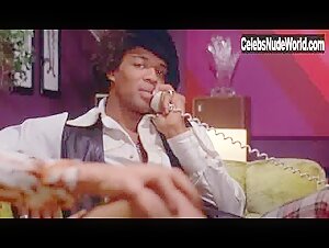 Pam Grier nude, boobs scene in Hit Man (1972) 15