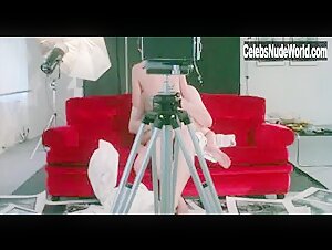 Stefania Casini in Belly of an Architect (1987) 9