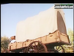 Taimie Hannum Kissing , boobs in Timegate: Tales of the Saddle Tramps (1999) 13