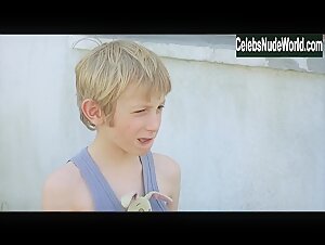 Adelaide Leroux Sunbathing , Topless in Home (2008) 1