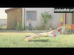 Adelaide Leroux Sunbathing , Topless in Home (2008) 4