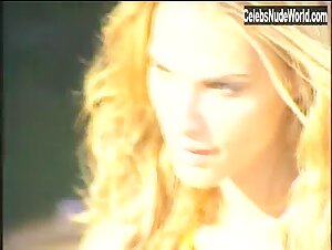 Molly Sims Sexy scene in Sports Illustrated: Swimsuit 2004 (2004) 19