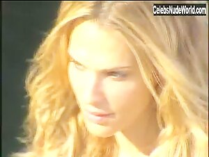 Molly Sims Sexy scene in Sports Illustrated: Swimsuit 2004 (2004) 20
