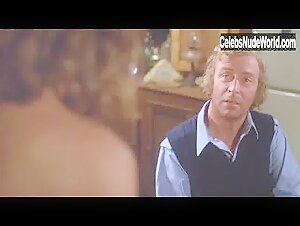 Annie McEnroe breasts, bush scene in The Hand (1981) 14