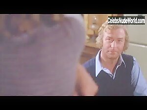 Annie McEnroe breasts, bush scene in The Hand (1981) 2