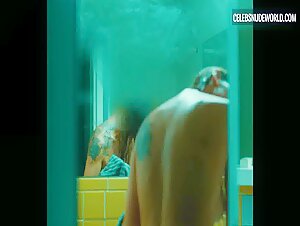 Trace Lysette breasts, Nude scene in Monica (2022) 10