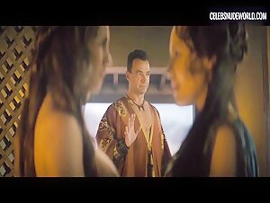 Ivana Baquero, Jaime Slater breasts, lesbian scene in Spartacus: House of Ashur (2025)